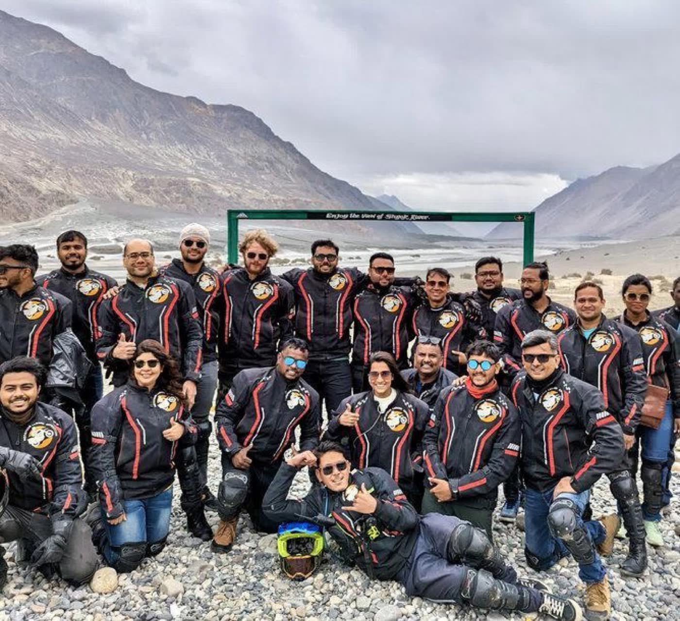 Large Mototour group at the Shyok river in Nubra near Turtuk